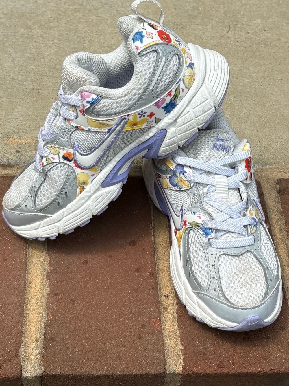 Nike Kids White and Gray Sneakers with Multicolor Floral Accents